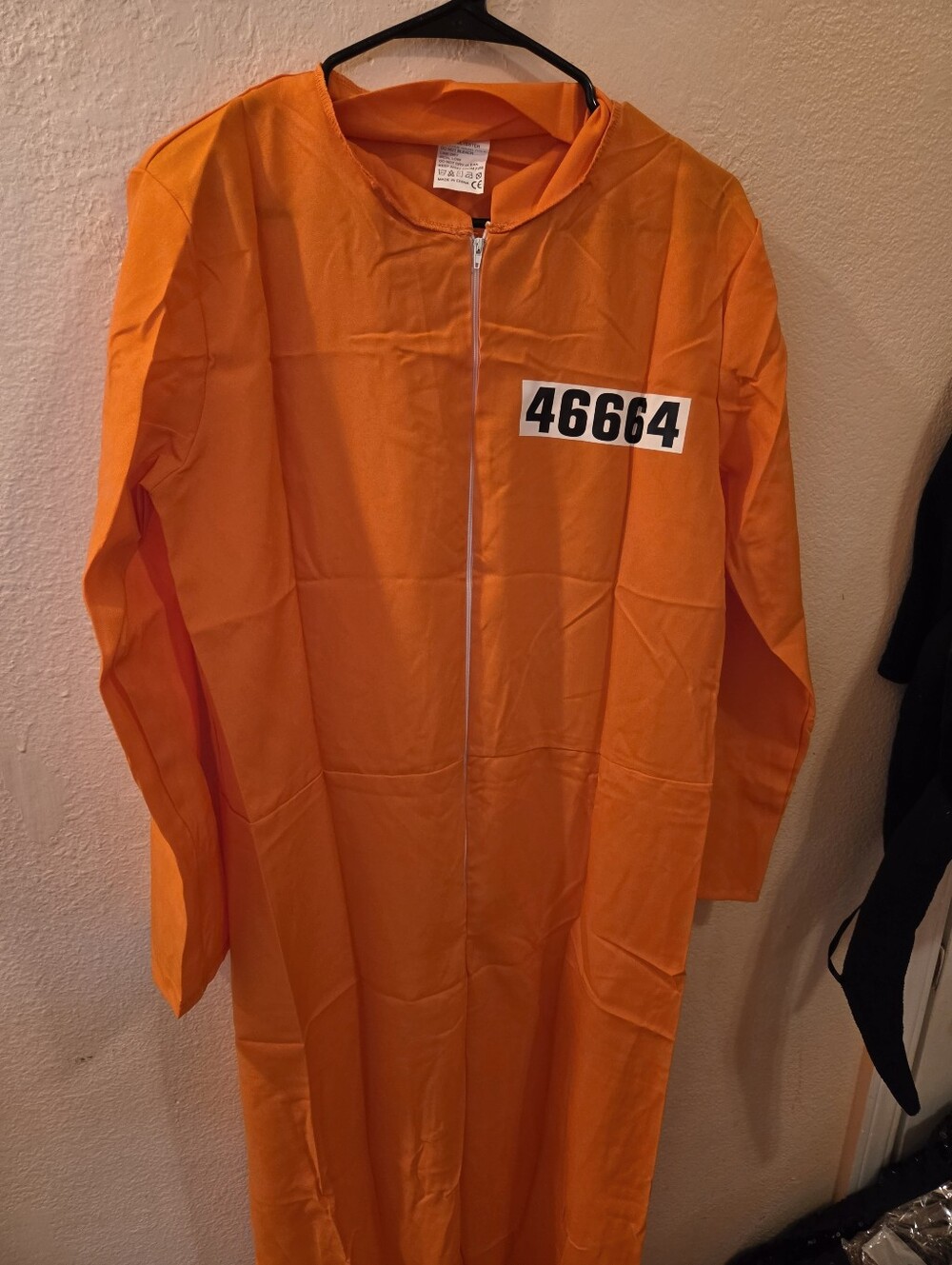Orange jumpsuit-like coat